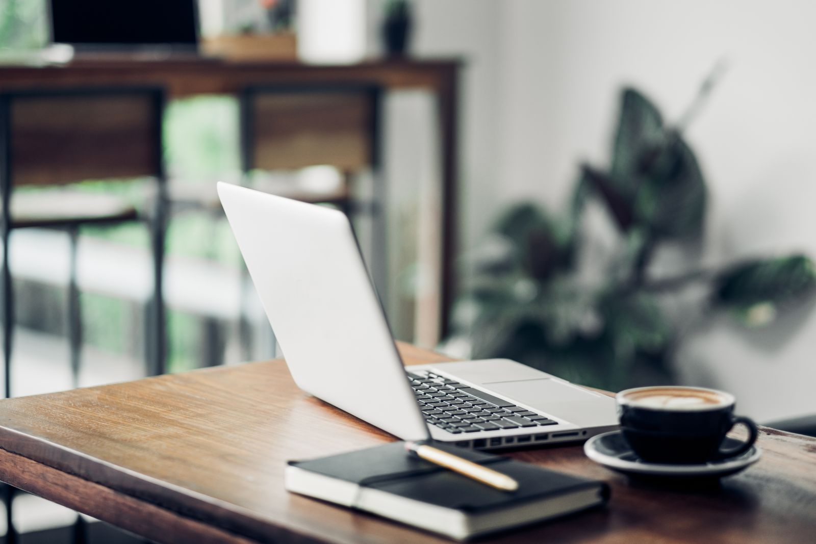 Laptop on a desk for the best laptops for students and office work guide