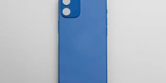 Blue smartphone on a grey surface